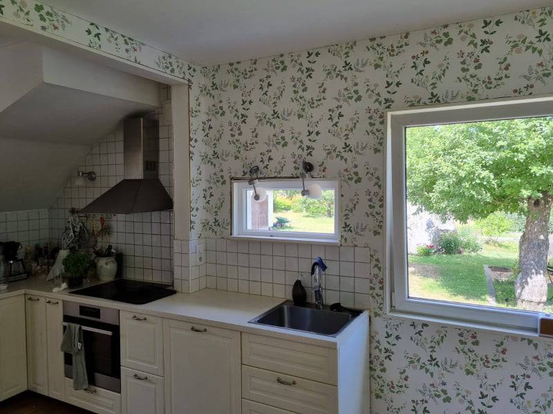 Bild 2 av referensprojekt Tapesering av ett kök med bild tapet.