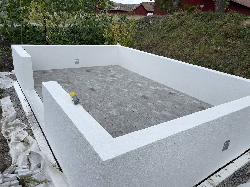 Bild 10 av referensprojekt Olika växthus fundament med stensättning