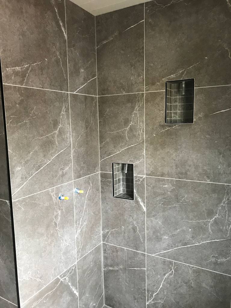 Bild 18 av referensprojekt Namn på projekt: Badrumsrenovering – tätskikt och kakelsättning