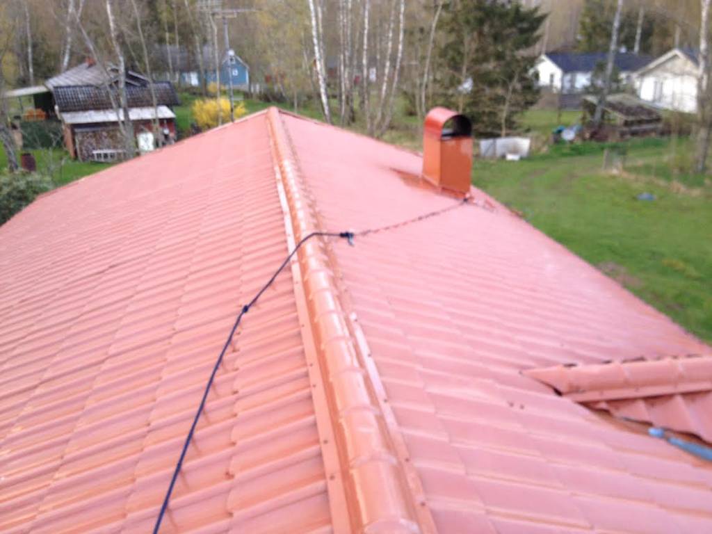 Bild 4 av referensprojekt Ludvigsborg Takmålning