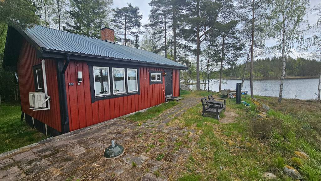Bild 2 av referensprojekt Altanbygge med kanalplasttak, räcke och ny vägg