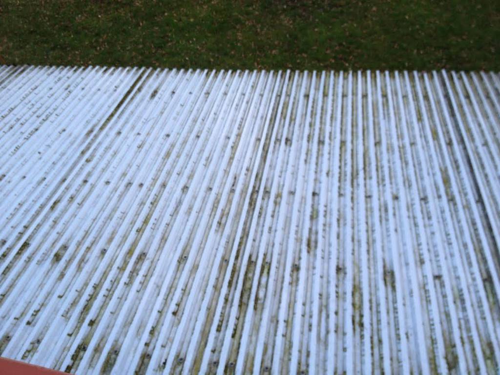 Bild 1 av referensprojekt Ludvigsborg Takmålning