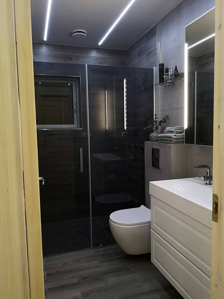 Bild 1 av referensprojekt Exklusivt badrum med microcement och kakel